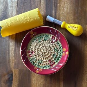 Evelyn's Kitchen Red and Yellow garlic grating plate, garlic peeler and brush